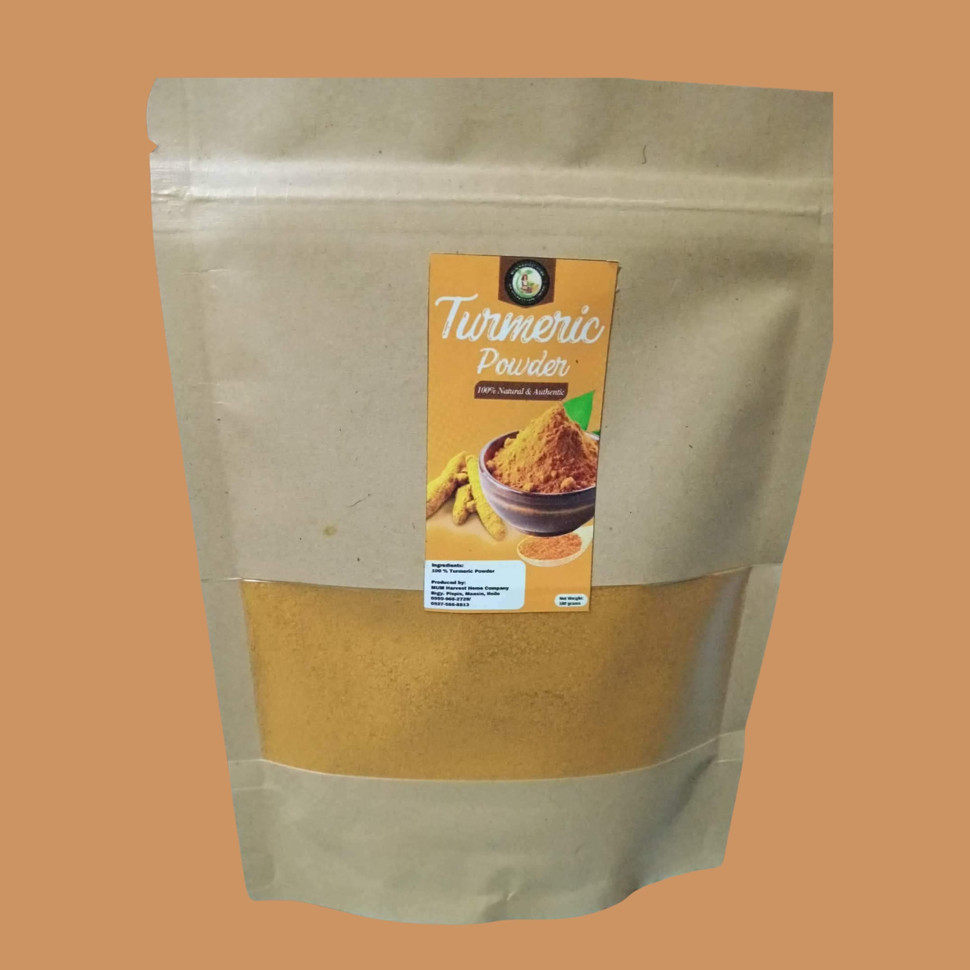Artisanal craft jar of vivid deep-orange Turmeric Powder with golden turmeric rhizomes on rustic wood